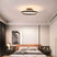 Modern Light Pendant illuminating a stylish bedroom with elegant decor and furnishings
