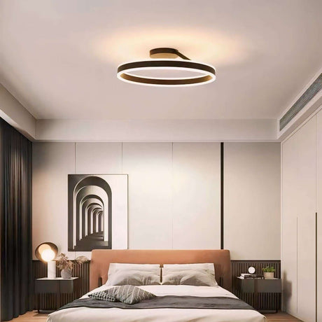 Modern Light Pendant illuminating a stylish bedroom with elegant decor and furnishings