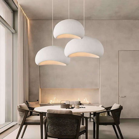 Nisu Home Light Pendant Trio in a Modern Dining Room with Soft Lighting and Elegant Design