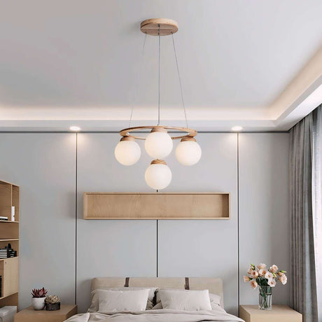 Nisu Home Light Pendant featuring four frosted globes for elegant bedroom lighting