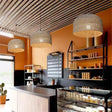Stylish Nisu Home Light Pendant in a Chic Cafe Setting with Contemporary Decor