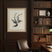 Beautiful Linen Artwork of a fern displayed in a stylish library setting with vintage books