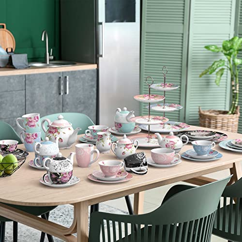 Elegant Afternoon Tea Set displayed on a table featuring floral teapots, cups, and tiered stands