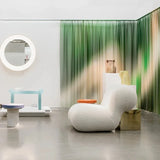 Stylish Nisu Home Lounge Chair in a modern interior design setting with vibrant decor elements