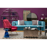 Orsina Lounge Chair in bold red fabric, complementing a chic living room setup
