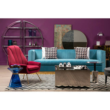 Orsina Lounge Chair in bold red fabric, complementing a chic living room setup