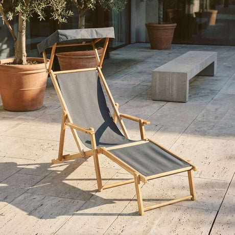 Orsina Outdoor Lounger with Adjustable Canopy and Comfortable Grey Fabric for Relaxing Outdoors