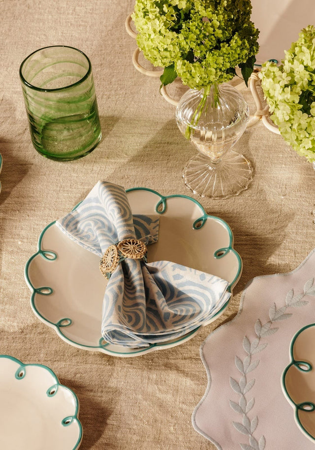 Casa by Josephine Jenno lunch plate with elegant scalloped design, styled with a decorative napkin