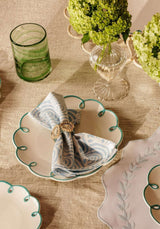 Casa by Josephine Jenno lunch plate with elegant scalloped design, styled with a decorative napkin