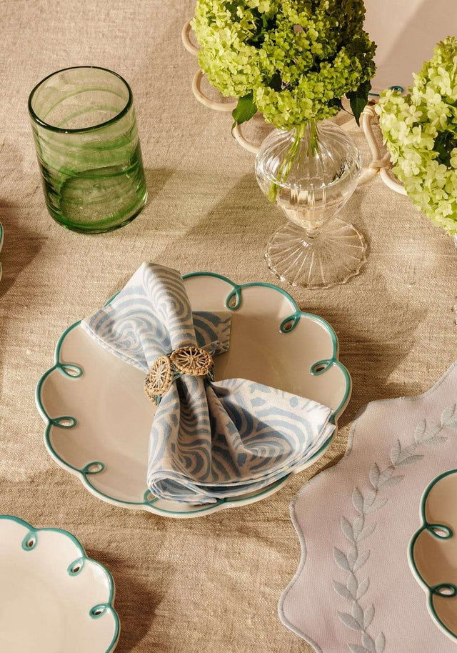 Casa by Josephine Jenno lunch plate with elegant scalloped design, styled with a decorative napkin