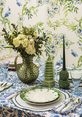 Casa by Josephine Jenno green lunch plate set on a decorative table with fresh flowers and garden-themed decor