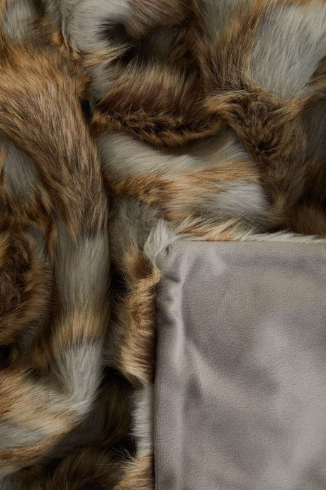 Orsina Fur Throw with a Luxurious Soft Texture and Rich Warm Tones for Comfort