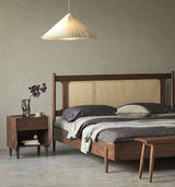 Elegant Nisu Home luxury bed with a wooden frame and stylish grey bedding in a modern bedroom