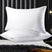 OLIVIA ROCCO Luxury Pillows in white with a subtle striped pattern for a stylish and comfortable sleep