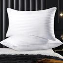 OLIVIA ROCCO Luxury Pillows in white with a subtle striped pattern for a stylish and comfortable sleep
