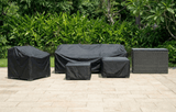 MINT Outdoor Garden Sofa Set covered with protective tarps in an outdoor setting
