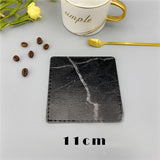 Stylish black marble placemat for dinnerware, measuring 11cm, perfect for dining tables
