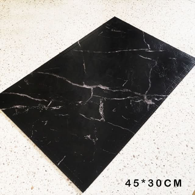 Elegant black marble placemat from Kitchen Essentials, perfect for enhancing dinnerware presentations