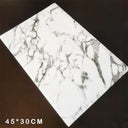 Elegant white marble placemats from Kitchen Essentials for enhancing dinnerware settings