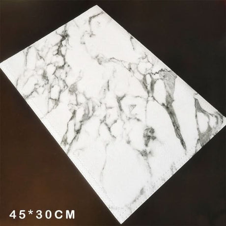 Elegant white marble placemats from Kitchen Essentials for enhancing dinnerware settings