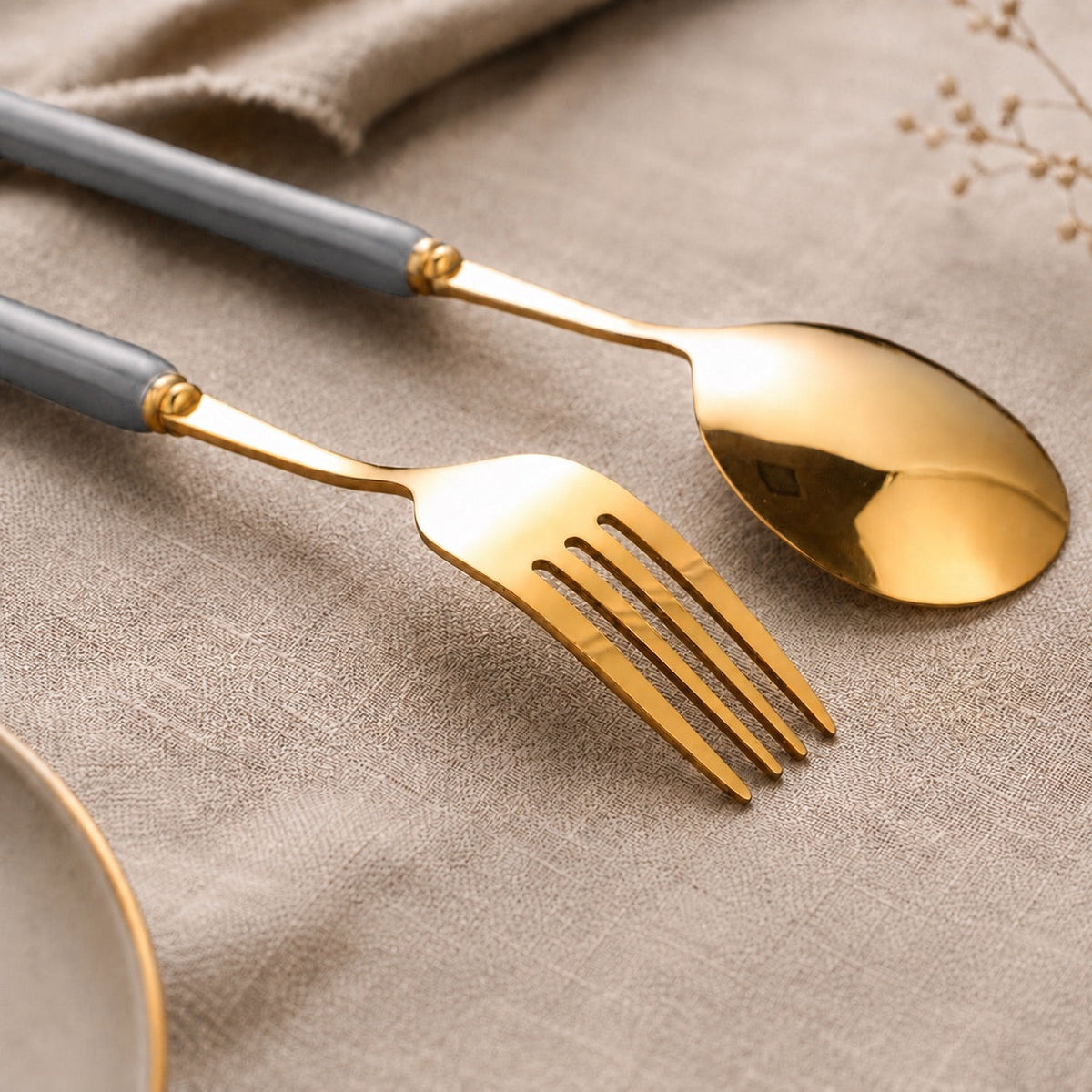 KitchBoom Cutlery Set with elegant gold finish and grey handles for stylish dining