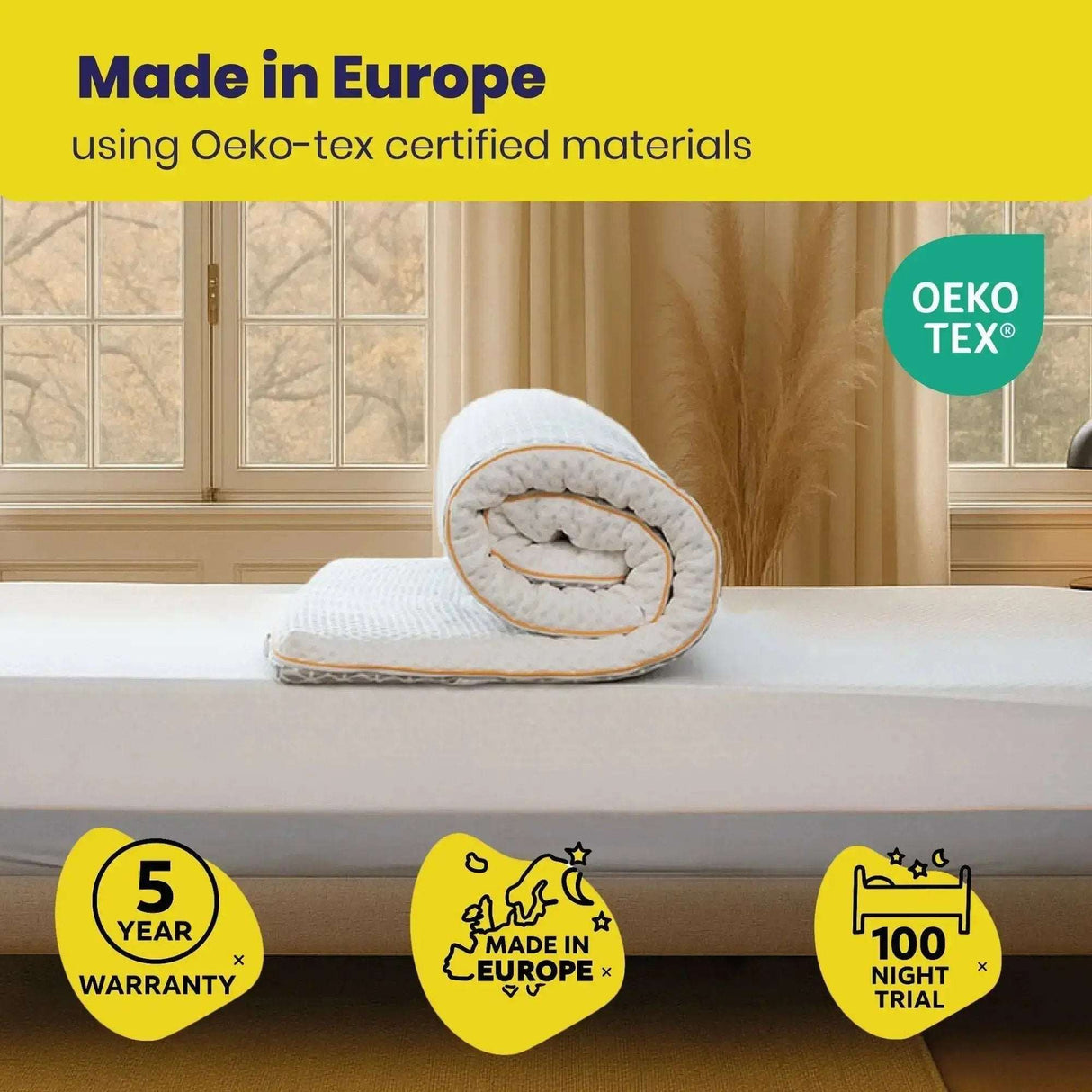 Brightr Sleep Memory Foam Mattress Topper rolled up on a bed, made in Europe with Oeko-tex certification
