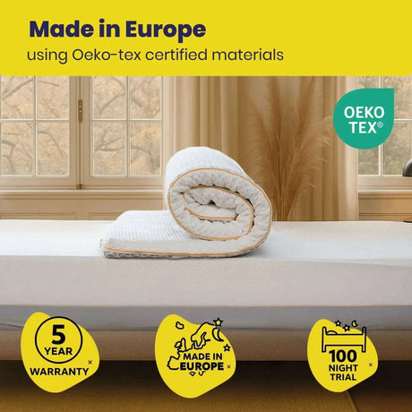 Brightr Sleep Memory Foam Mattress Topper rolled up on a bed, made in Europe with Oeko-tex certification