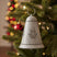 Beautiful metal hanging bell decorated with snowflakes, perfect for Christmas tree decorations