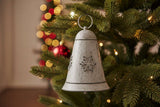Beautiful metal hanging bell decorated with snowflakes, perfect for Christmas tree decorations