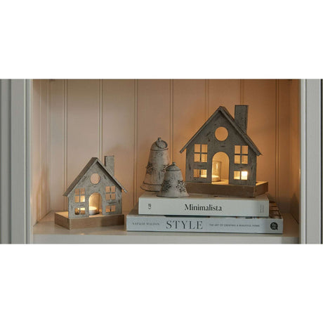 Shades 4 Seasons Metal Hanging Bell with decorative houses and books for festive Christmas decor
