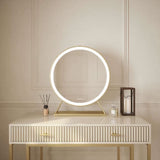Hollywood mirror with backlit circular design on a stylish dresser, creating a luxurious ambiance