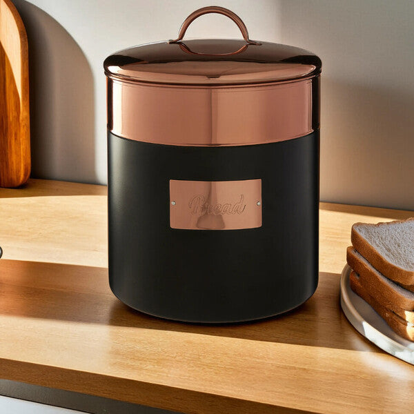 Stylish Orsina Bread Bin in black with a copper lid, perfect for kitchen storage