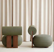 Nisu Home Stylish Chair with Unique Round Design and Wooden Accents for Modern Interiors