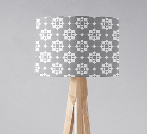 Shadow Bright lampshade with geometric grey pattern on a wooden lamp base