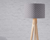 Shadow Bright stylish grey patterned lampshade on a modern wooden floor lamp