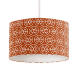 Shadow bright patterned lampshade in orange with a geometric design for stylish lighting