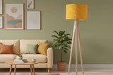 Shadow Bright Yellow Lampshade on a Modern Floor Lamp in a Stylish Living Room Setting