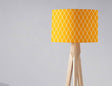 Bright yellow lampshade with a geometric pattern for stylish home decor