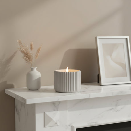 Elegant LED Candle by Shades 4 Seasons displayed on a marble shelf with stylish decor