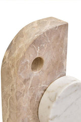 Orsina Marble Sculpture featuring unique geometric shapes and natural stone finishes