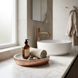 Orsina Soap Dish in Copper with Decorative Stones and Rolled Towel for Modern Bathrooms