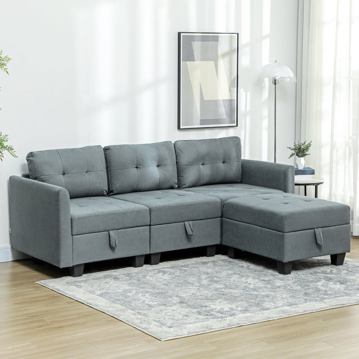 Stylish Modular Sofa in grey with tufted cushions and a spacious chaise lounge for modern living rooms
