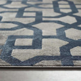 Stylish Moroccan Rug featuring a geometric blue pattern on a soft cream background