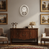 Classic Widdop Motion Clock on a wall above a wooden sideboard in an elegant living room setting