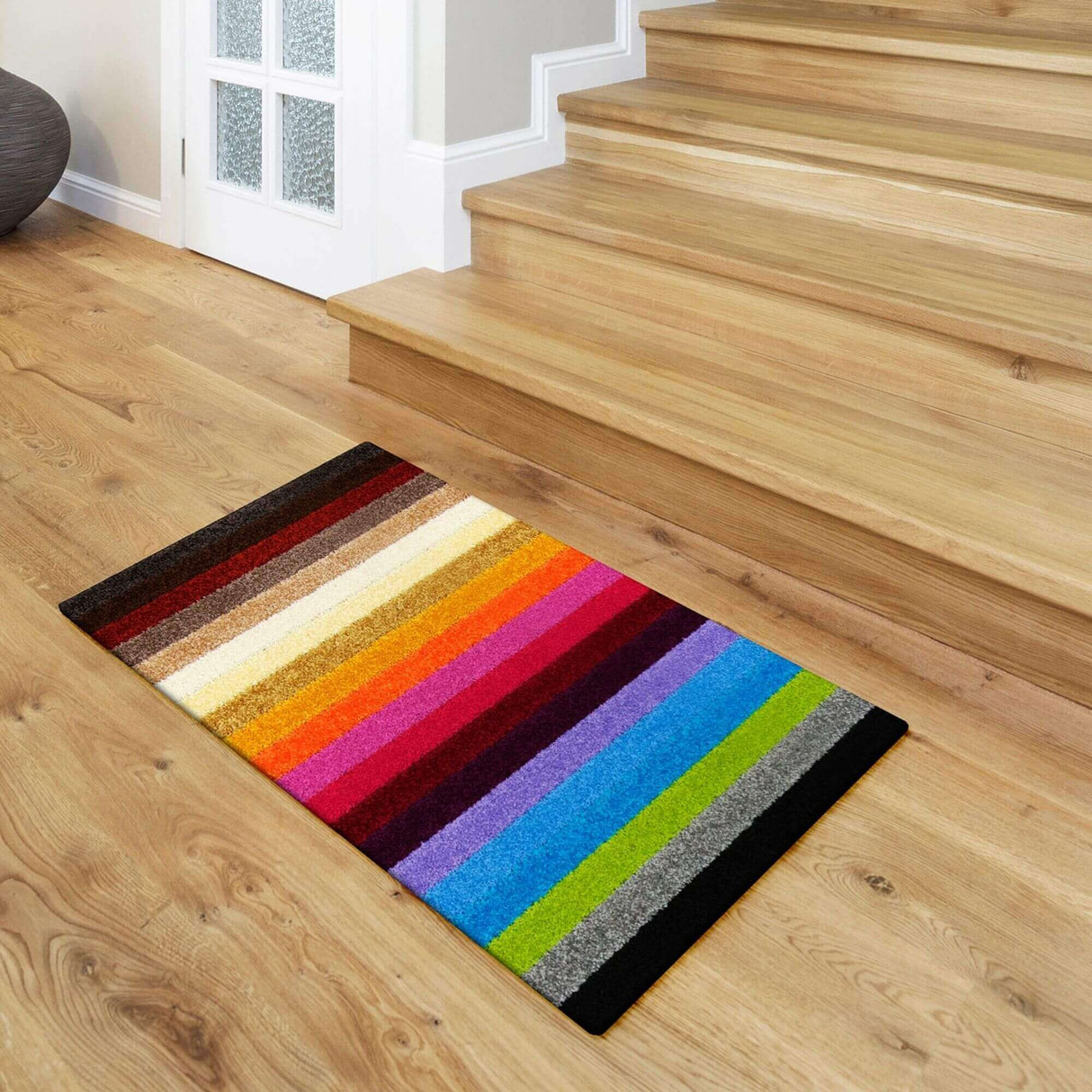 Vibrant multicolour rugs featuring bold stripes, perfect for brightening any interior space