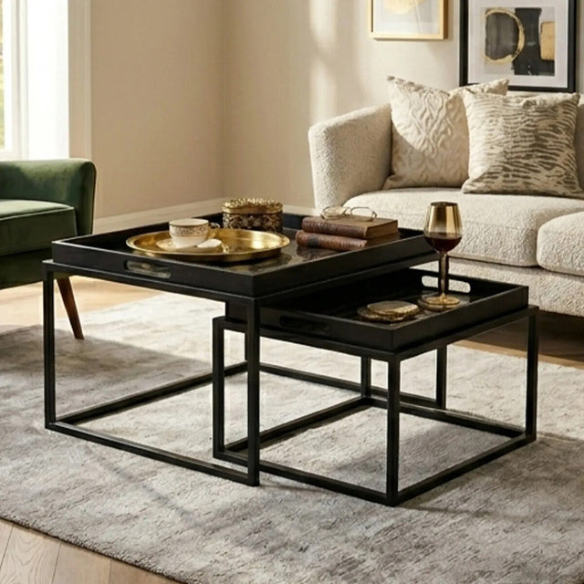 Orsina Nesting Tray Tables in black with gold trays, perfect for modern living room decor