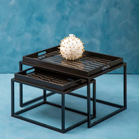 Orsina Nesting Tray Tables in black metal with a decorative spiky vase on top