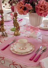 Elegant table setting featuring a Casa by Josephine Jenno Nibbles Bowl with pink and white floral decor