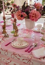 Elegant dining setup featuring a Casa by Josephine Jenno Nibbles Bowl amidst floral decor