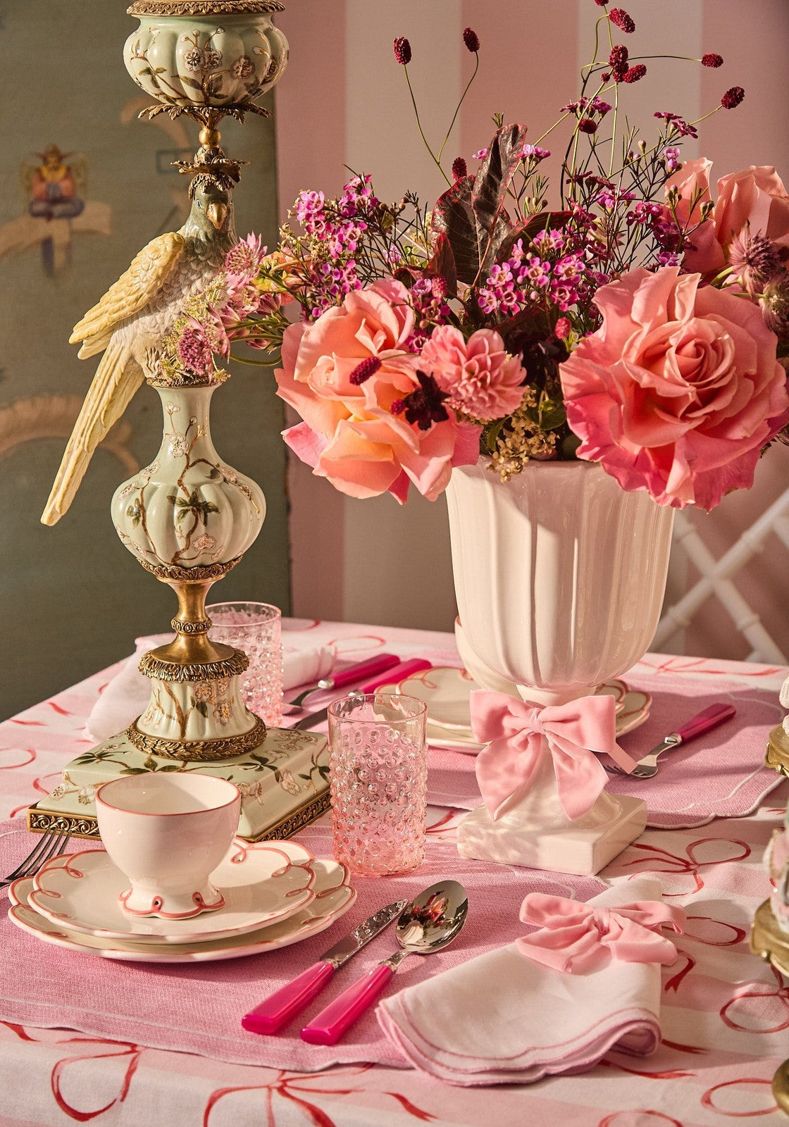Elegant table setting featuring a Casa by Josephine Jenno Nibbles Bowl with floral decor and pink accents